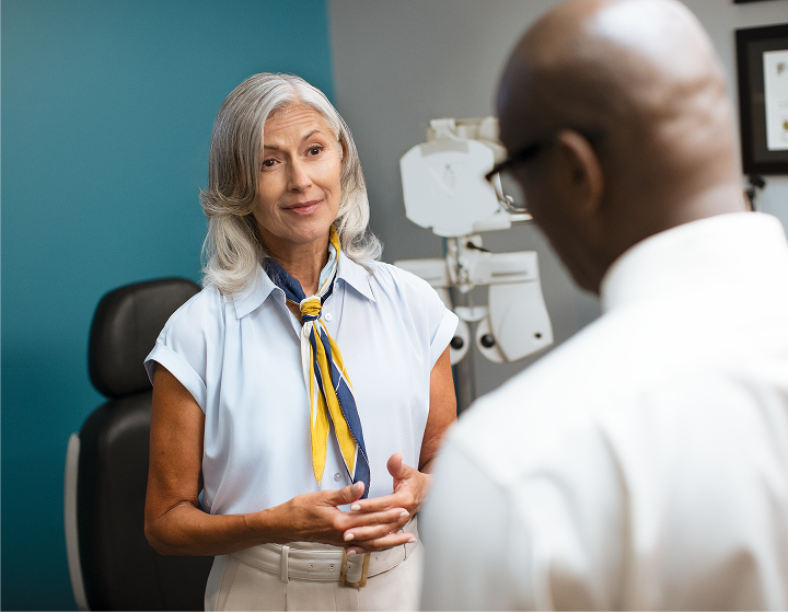 Woman speaking with doctor