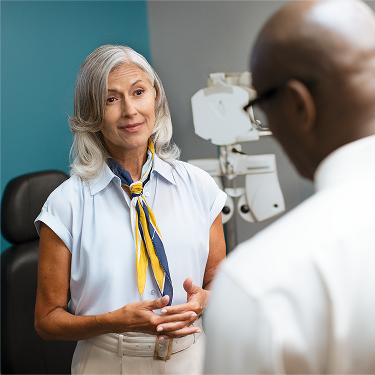 Woman speaking with doctor
